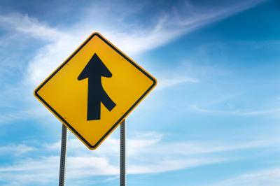 Traffic sign showing a lane merger