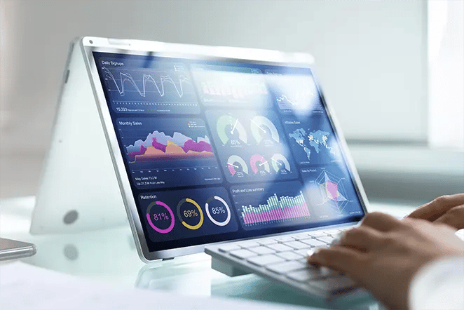 Tablet device displaying various data graphs and charts