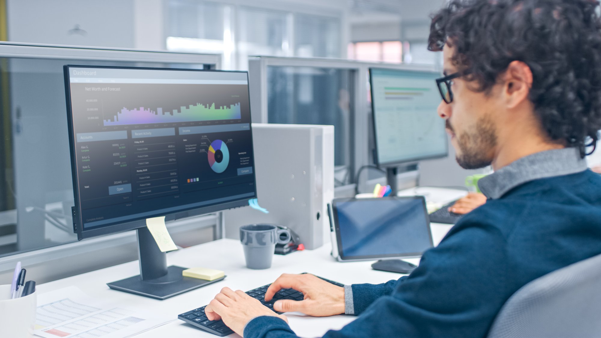 Man reviewing data on a computer montior