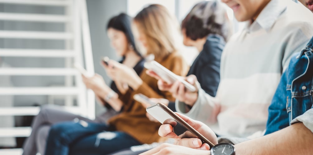 People looking on their phones