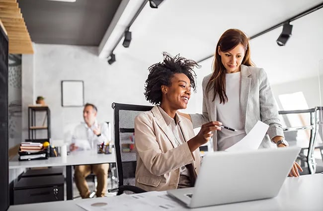 Professional workers collaborating in an office