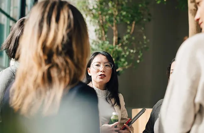 Group of professional women talking in a lobby