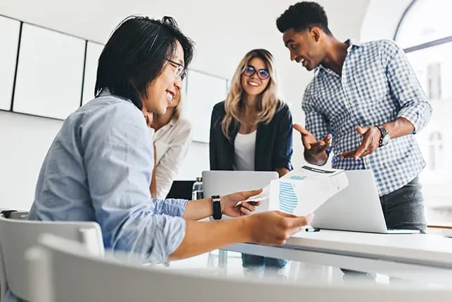 Several business professionals having fun at a business meeting