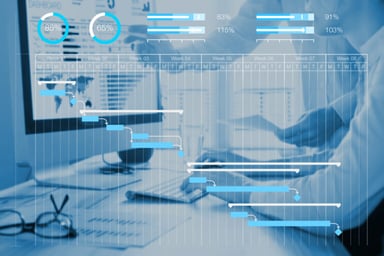 Transparent graphs and data over person working in lab