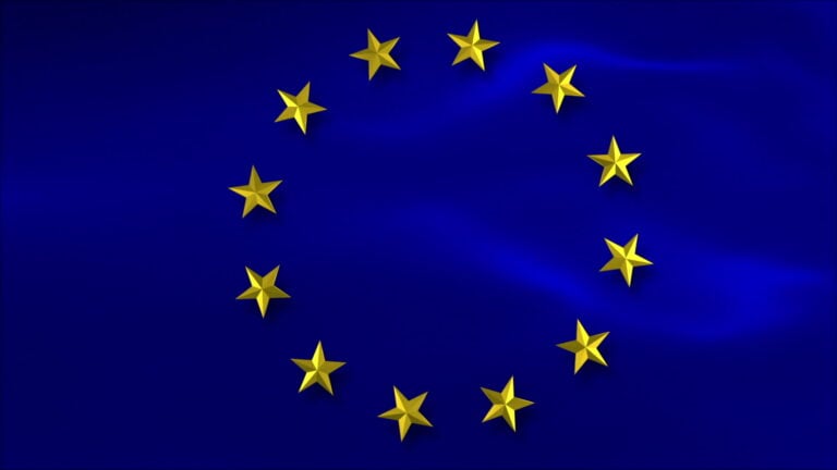 European Flag stars over a wavy blue background.