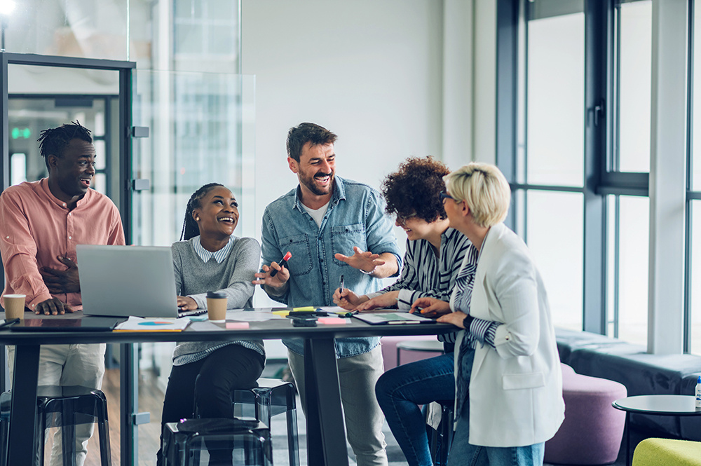 Business team having fun at meeting in an office