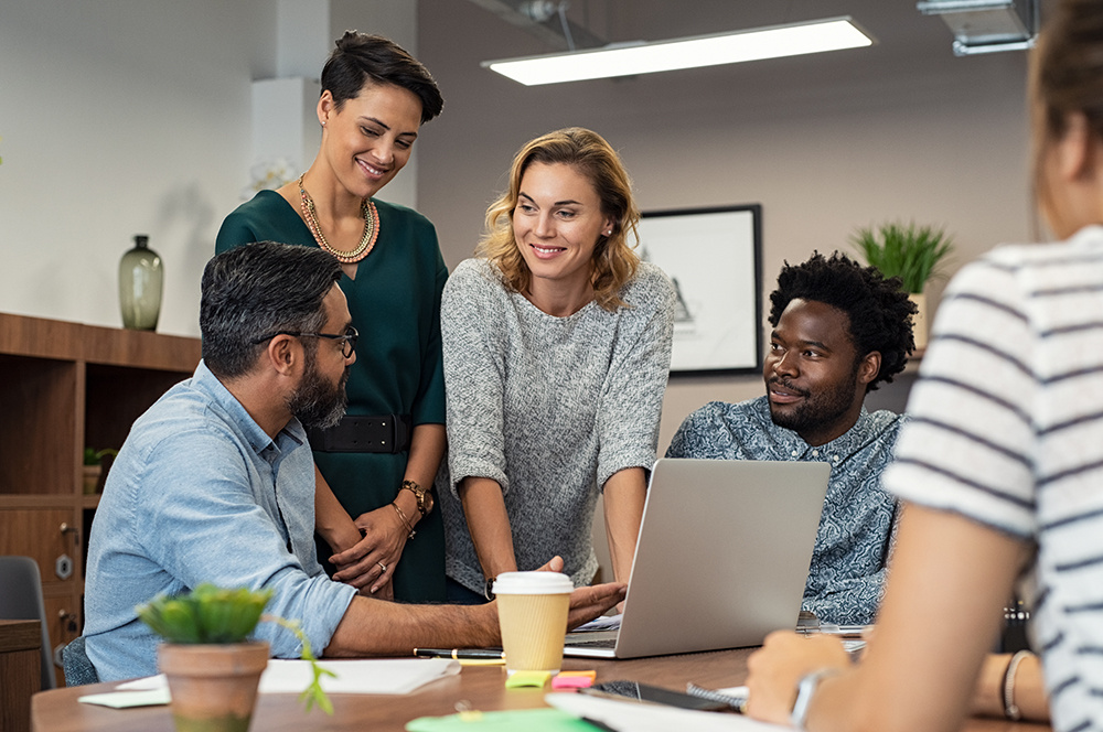 Creative business professionals working together at a table