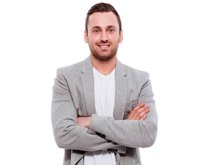 Male GxP auditor standing with arms crossed wearing grey jacket