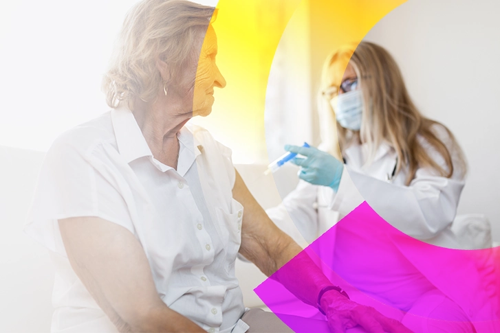 A patient receiving an injection from a nurse.