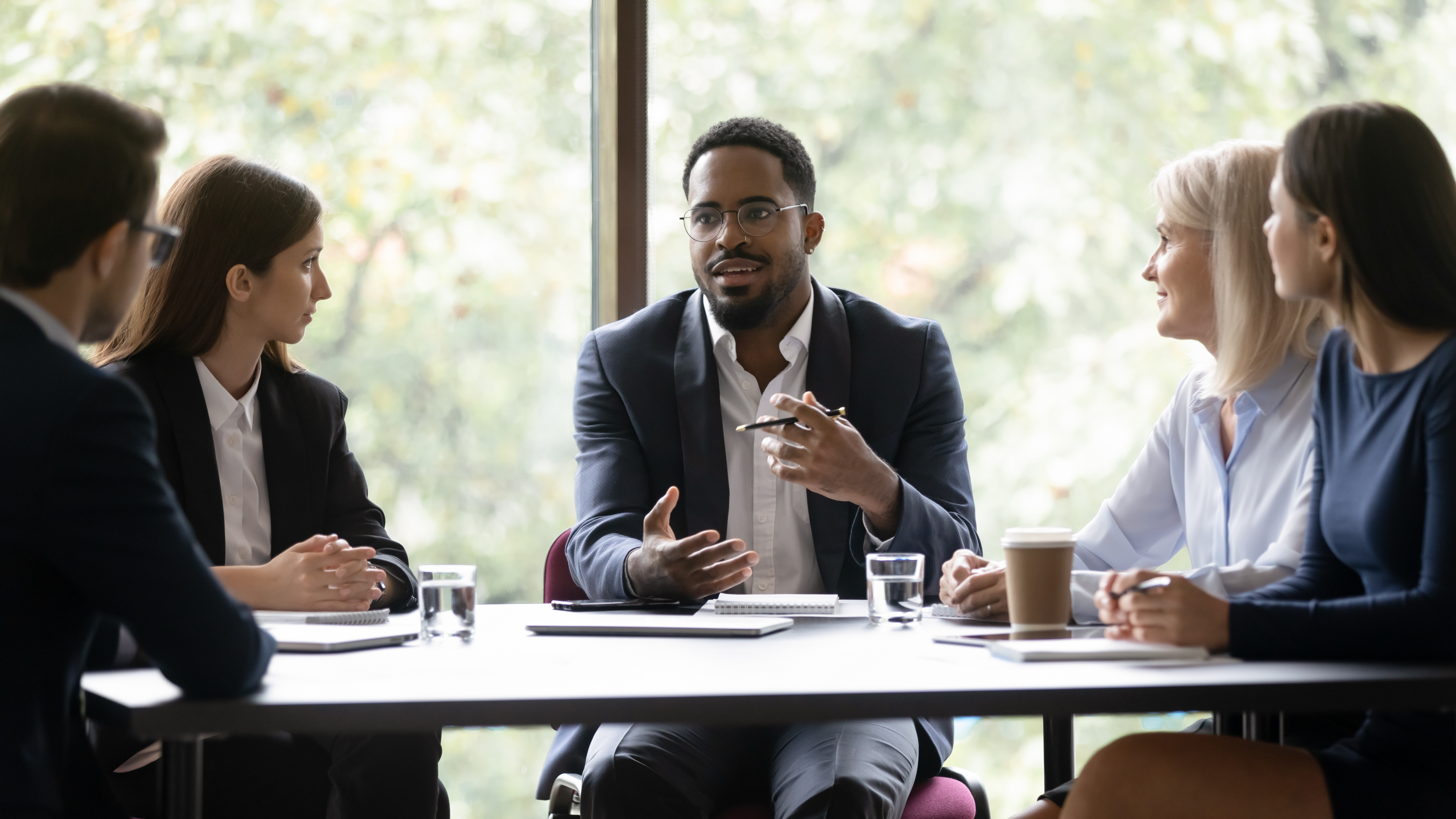 business-man-presenting-at-meeting-as_445856589