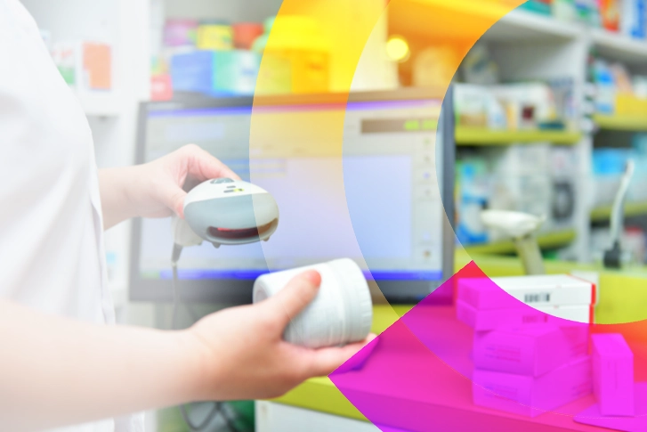 A person scanning a prescription medication into the computer